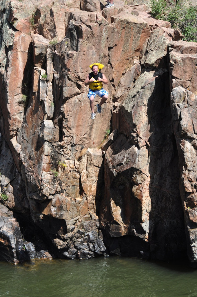 Person jumping into river